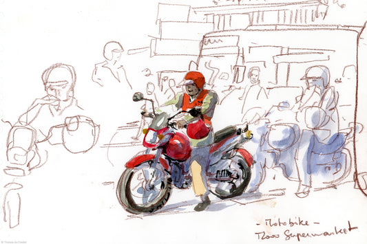 Moto taxi devant le 2000 Supermarket